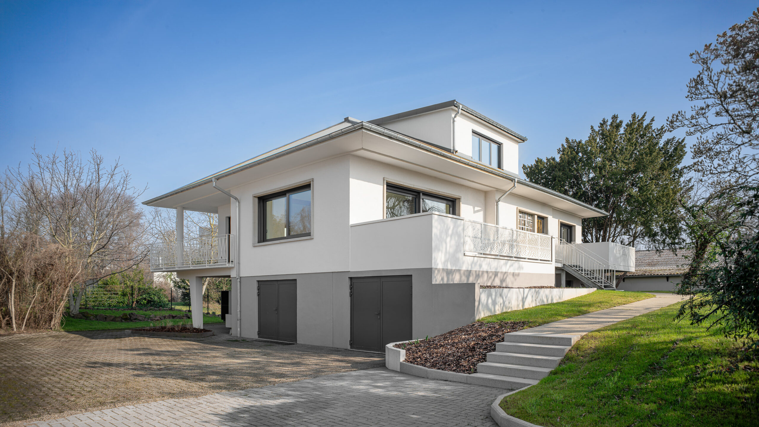 façade-enduit-gris-toiture-aluminium-ostwald façade-enduit-gris-toiture-aluminium-ostwald